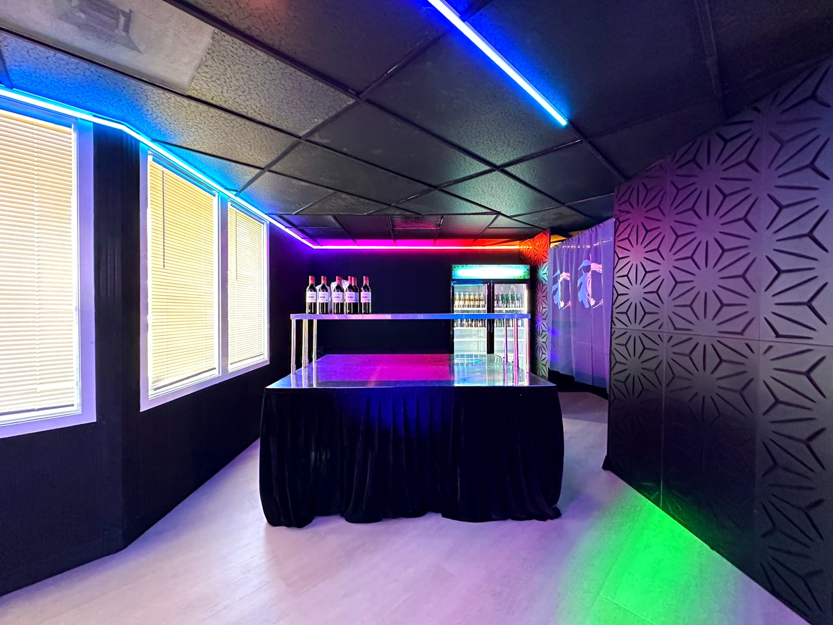 Bar counter set with wine under colour-changing LEDs